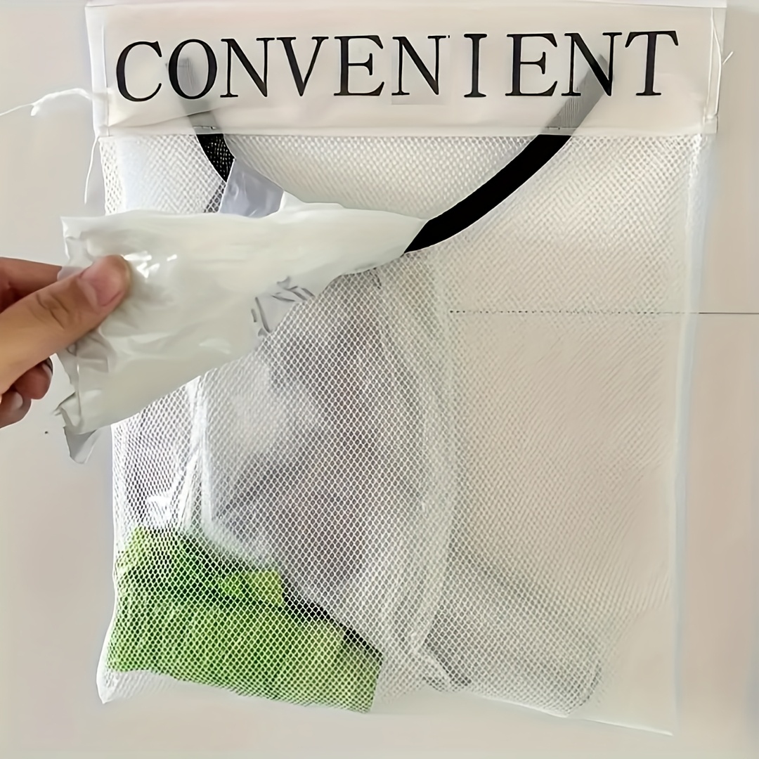 A Versatile Wall-Mounted Plastic Bag Holder - a Reusable Elastic Storage Net with, Making It an Ideal Choice for Kitchen Organization.